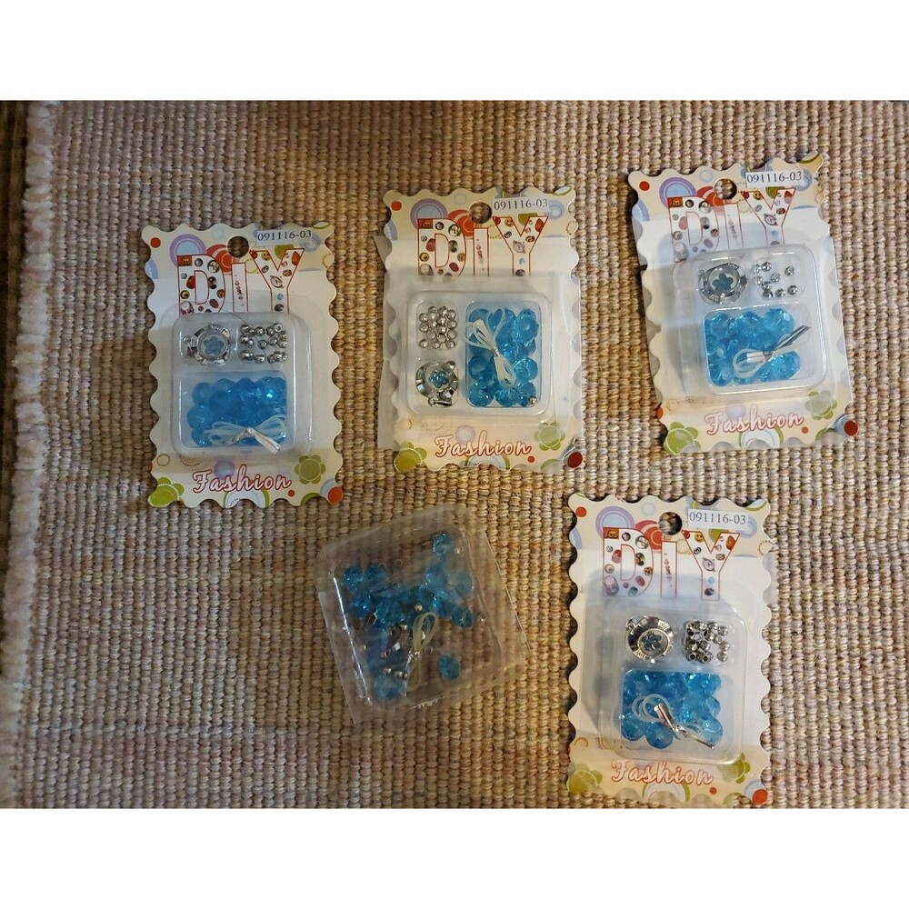 4 packages of Fiona Crystal 091116-03 Spinner Charm Bracelet Kit